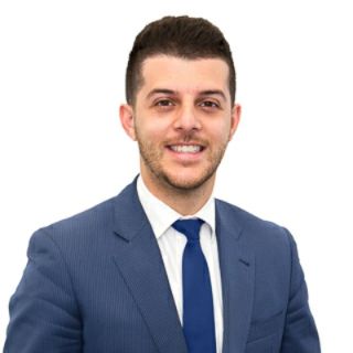 Kosma Comino - Real Estate Agent