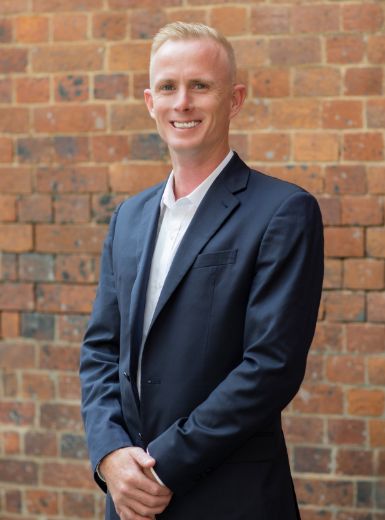 Corey Lindh - Real Estate Agent at Revolution Property Group