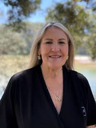 Tracy Cooper - Real Estate Agent