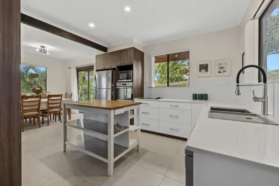 Elevated Living with Views, Modern Renovations & Expansive Yard