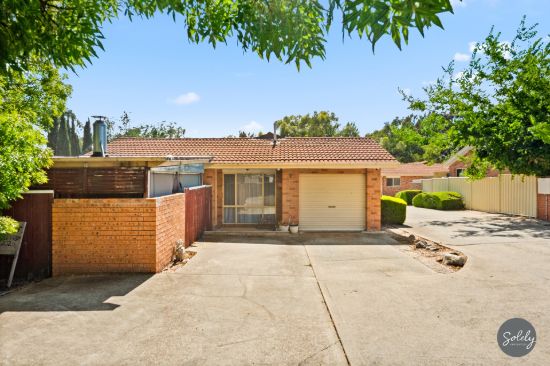 Investor-friendly townhouse with locked-in lease.