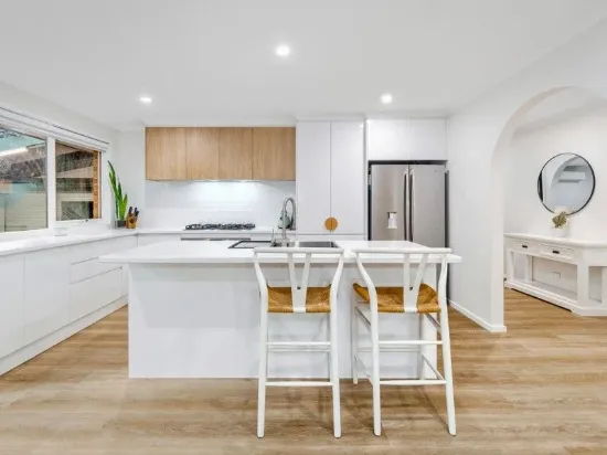 COMPLETE TRANSFORMATION IN A WELL-CONNECTED ENCLAVE - AMENITY FILLED LOCALE!