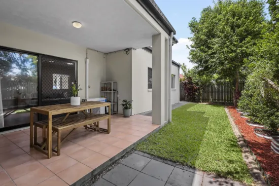 Ground floor unit with large private courtyard and internal double garage
