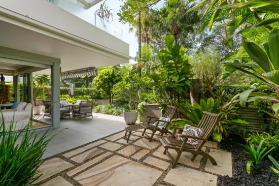 Elegant Ground Floor Residence with Private Landscaped Gardens and Unique Studio Retreat