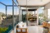 **WATCH THE VIDEO TOUR HOSTED BY MATT GILBEE** Architecturally designed home with a modern renovated interior