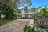 Spacious dual-living Family Home with Pristine Pool