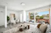 Bright and airy apartment in tranquil lagoon-side setting