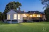 Country Calm Meets Convenience  4.6 Acres with Home & Sheds
