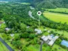 Modern Acreage Living with Tropical backdrop and Exceptional Entertaining