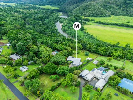 Modern Acreage Living with Tropical backdrop and Exceptional Entertaining