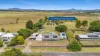 Sprawling pergola overlooking the 2+ acres & in-ground pool
