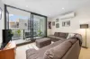 Stylish Prahran Apartment with Rooftop Entertaining & City Views.
