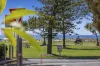 KIRRA BEACHSIDE – GROUND FLOOR APARTMENT WITH PRIVATE COURTYARD