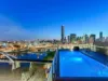 Elevated North-East Facing Apartment with City Views!