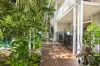 Tropical living just a stones throw from the Palm Cove Esplanade