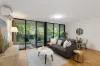 Full brick apartment with peaceful leafy outlook and storage cage