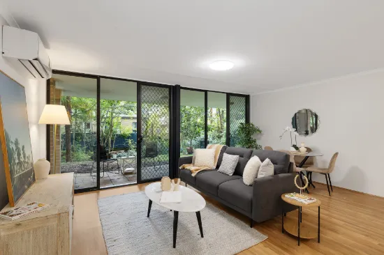 Full brick apartment with peaceful leafy outlook and storage cage