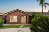 Coastal Living Just Steps from the Sand in West Lakes Shore