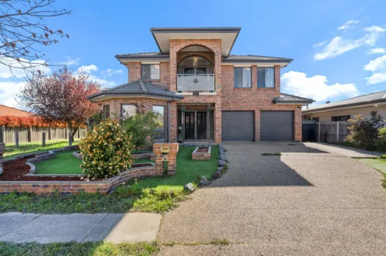Architectural and red-brick elegance with stunning Mulligans Flat Nature Reserve views