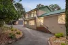 A Peaceful Acreage Sanctuary Offering Spacious Family Living