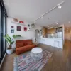 Light-Filled Living with East-Facing Wrap-Around Balcony 