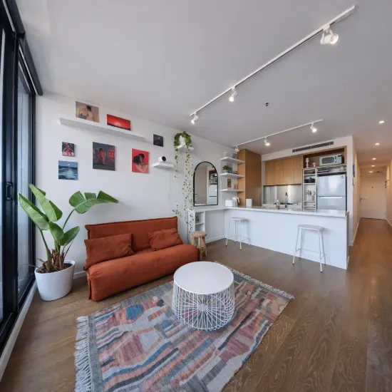 Light-Filled Living with East-Facing Wrap-Around Balcony 