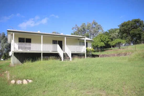 Home on Massive One Acre in Town