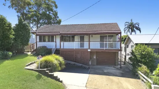 Original Home Offering Lake Views!