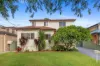 EXPANSIVE FAMILY RETREAT IN PEACEFUL POCKET