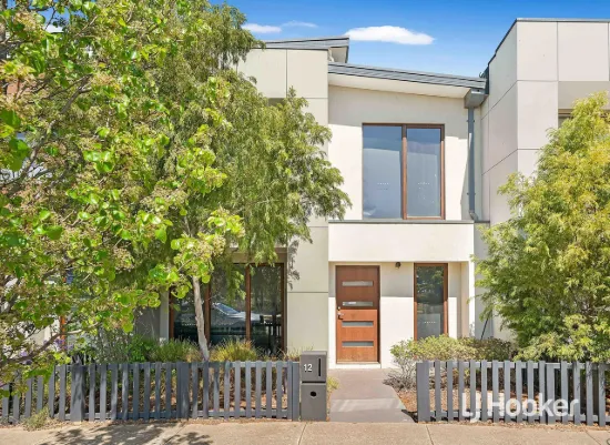 Contemporary Comfort in Coveted Riverwalk Estate