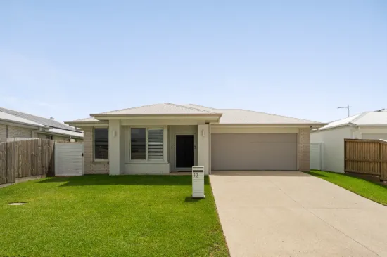 Near-New Coastal Lowset Home with Multiple Living Zones in Exclusive Shoreline Estate