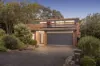 NATURE'S RETREAT WITH SPECTACULAR SPLIT-LEVEL LIVING IN DIAMOND CREEK