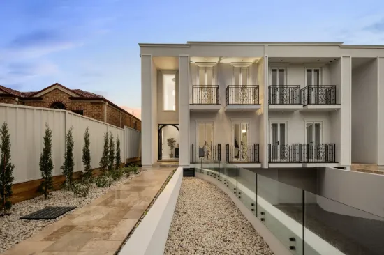 A striking brand new, architect-designed three-level luxury duplex, offering bespoke finishes and elevated living in a premier Croydon Park location