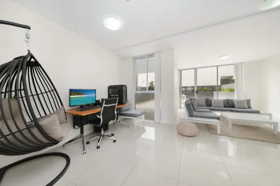 Exceptional Open Plan One-Bedroom Unit with Study Featuring a Spacious Paved Courtyard