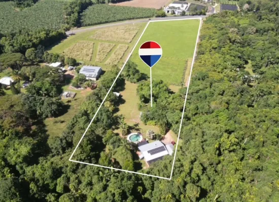Lagoon Style pool, home and two sheds