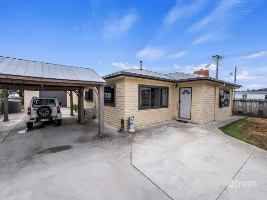 Need a Serious Shed? Four-Bedroom Home Just Steps from Town