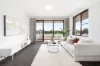 Serene, Elevated Two Bedroom Apartment with Wraparound Balcony & District Views