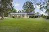 A Private Acreage Address with Polished Family Luxury