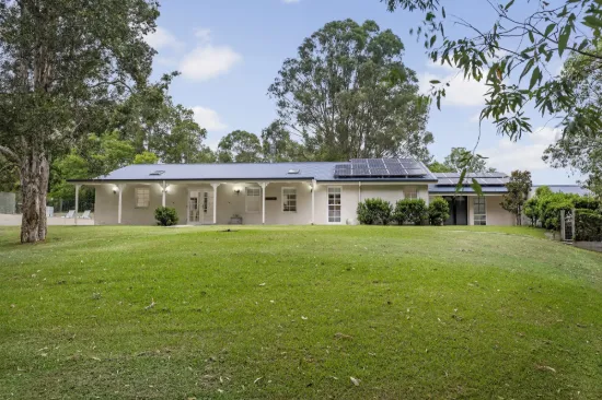 A Private Acreage Address with Polished Family Luxury