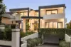 Brand-new tri-level luxury grand entertainer set in a coveted blue-ribbon address