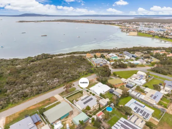 Captivating coastal living with exceptional potential...