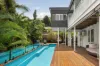 Elevated Family Home with Lap Pool and Sweeping City Views
