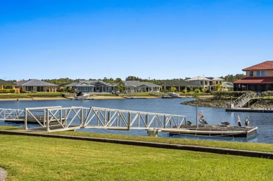 Waterfront Lifestyle Awaits  4-Bedroom Home with Private Pontoon Jetty