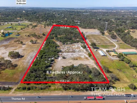 An Exceptional Opportunity on Thomas Road - Prime Investment Potential