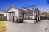 Park front living with updated interiors with self contained retreat for dual-income potential