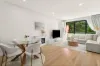 Modern Apartment Living Boasting Bright Interiors and Expansive Living Space