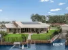 Waterfront Entertainer on Expansive 1,043m² with Boat Shed & Private Ramp