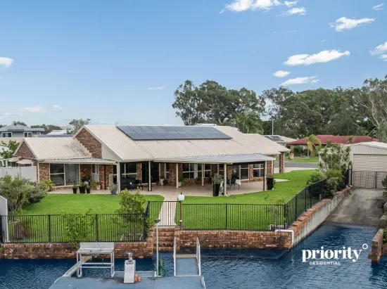 Waterfront Entertainer on Expansive 1,043m² with Boat Shed & Private Ramp