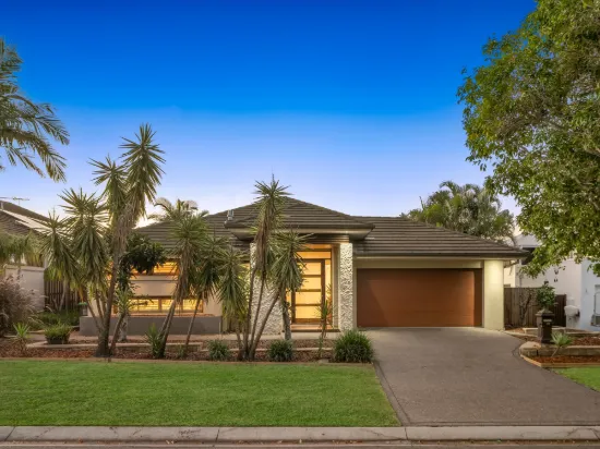A Private Designer Retreat in One of North Lakes' Finest Streets!