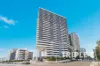 Rare Dual Parking & North and East Facing Apt: 2-Bed + 2-Bath + 2-Car with Stunning City & Water Views